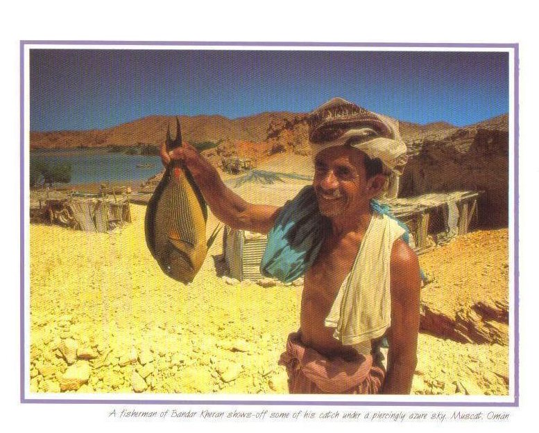 A Fisherman shows off his catch, Muscat, Oman Postcard