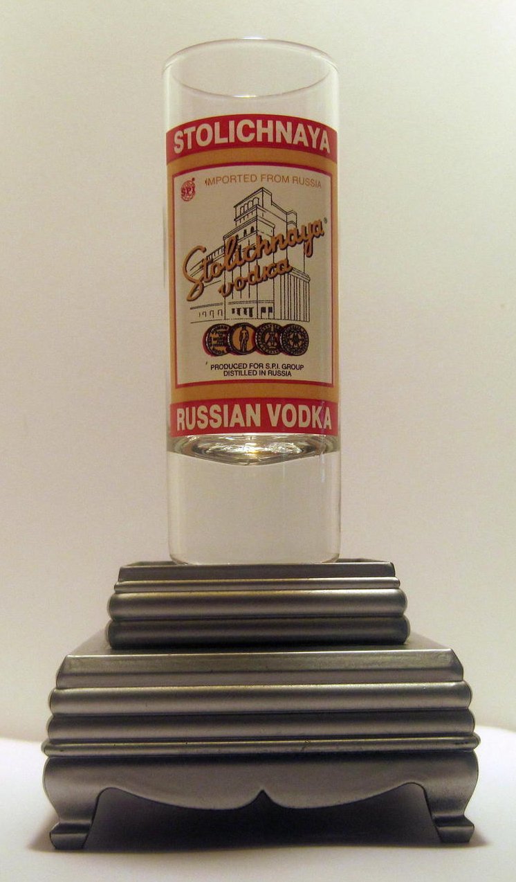 Stolichnaya Vodka Tall Collectible Shot Glass 2 oz 