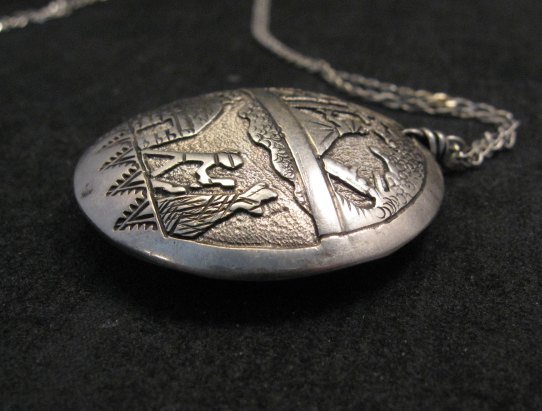 Image 1 of Navajo Native American Storyteller Hollow Silver Pendant w/chain - Dead Pawn