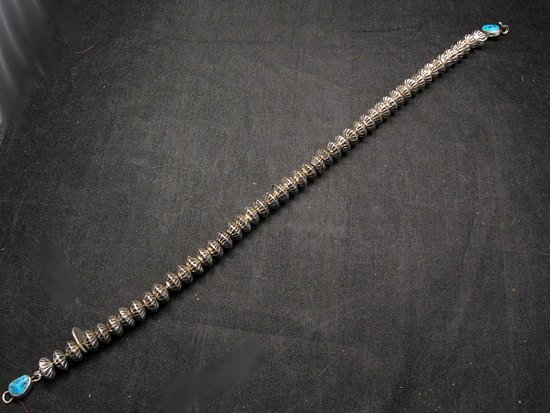 Image 9 of Orville Tsinnie Navajo Handmade Sterling Silver Stamped Fluted Bead Necklace