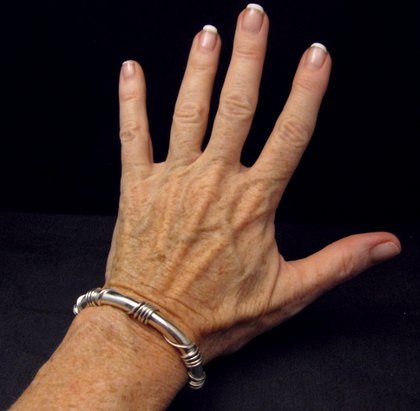 Image 2 of Navajo Orville Tsinnie Sterling Silver Wire Wrap Bracelet, Medium