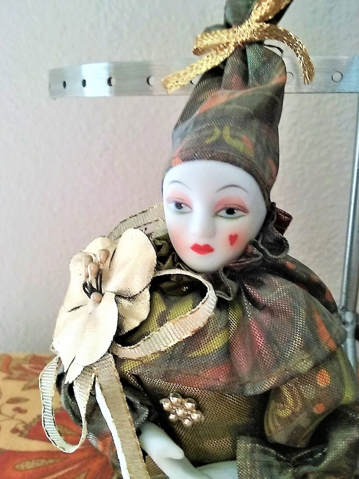 small porcelain clown dolls
